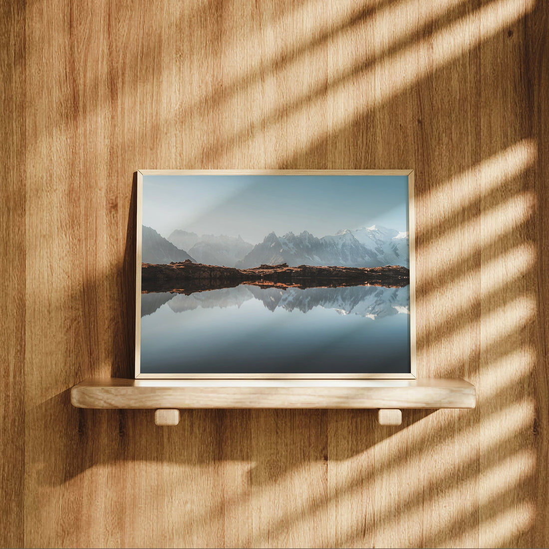 Scenic reflection wall art featuring Mont Blanc and jagged alpine peaks mirrored in a high-altitude lake near Chamonix.