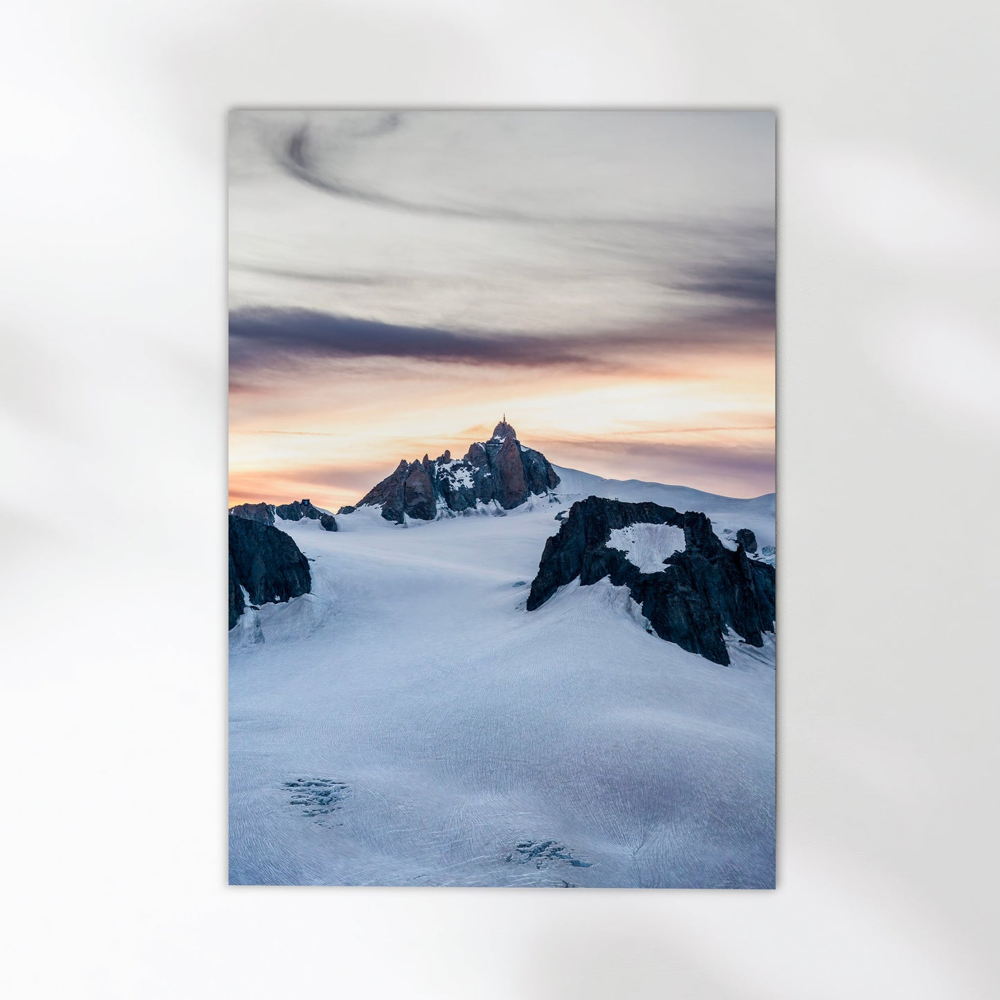 Chamonix mountain photography capturing the magical evening glow on Aiguille du Midi’s rugged summit.