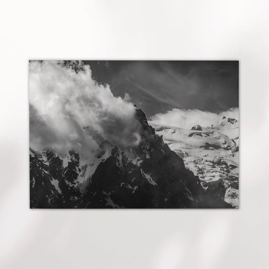 Dramatic black and white photo print of Aiguille du Midi summit shrouded in alpine mist, Chamonix, France.