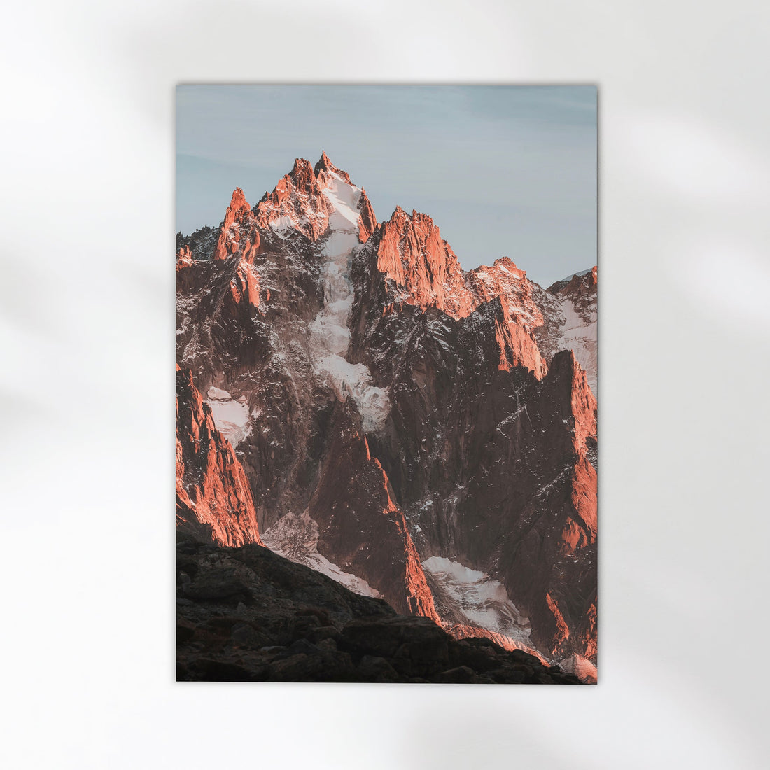 Stunning Chamonix mountain photography print capturing the sharp peaks reflected in a serene alpine pool.
