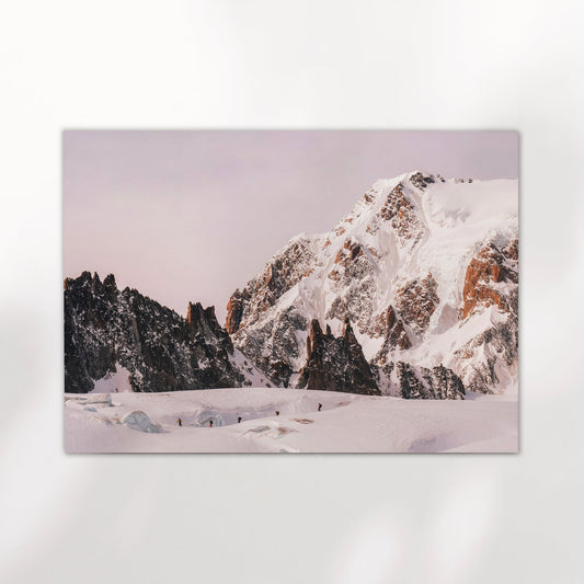 Breathtaking Chamonix mountain skiing wall art, featuring skiers traversing the dramatic glaciers of the Vallée Blanche.