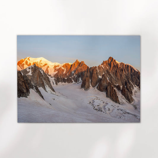 Fine art print of Mont Maudit and Mont Blanc du Tacul glowing at sunrise above the French Alps glacier.