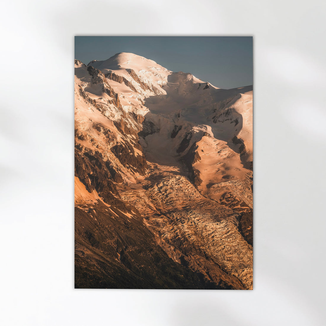 A stunning fine art print of Chamonix mountains bathed in warm evening light, perfect for any space.