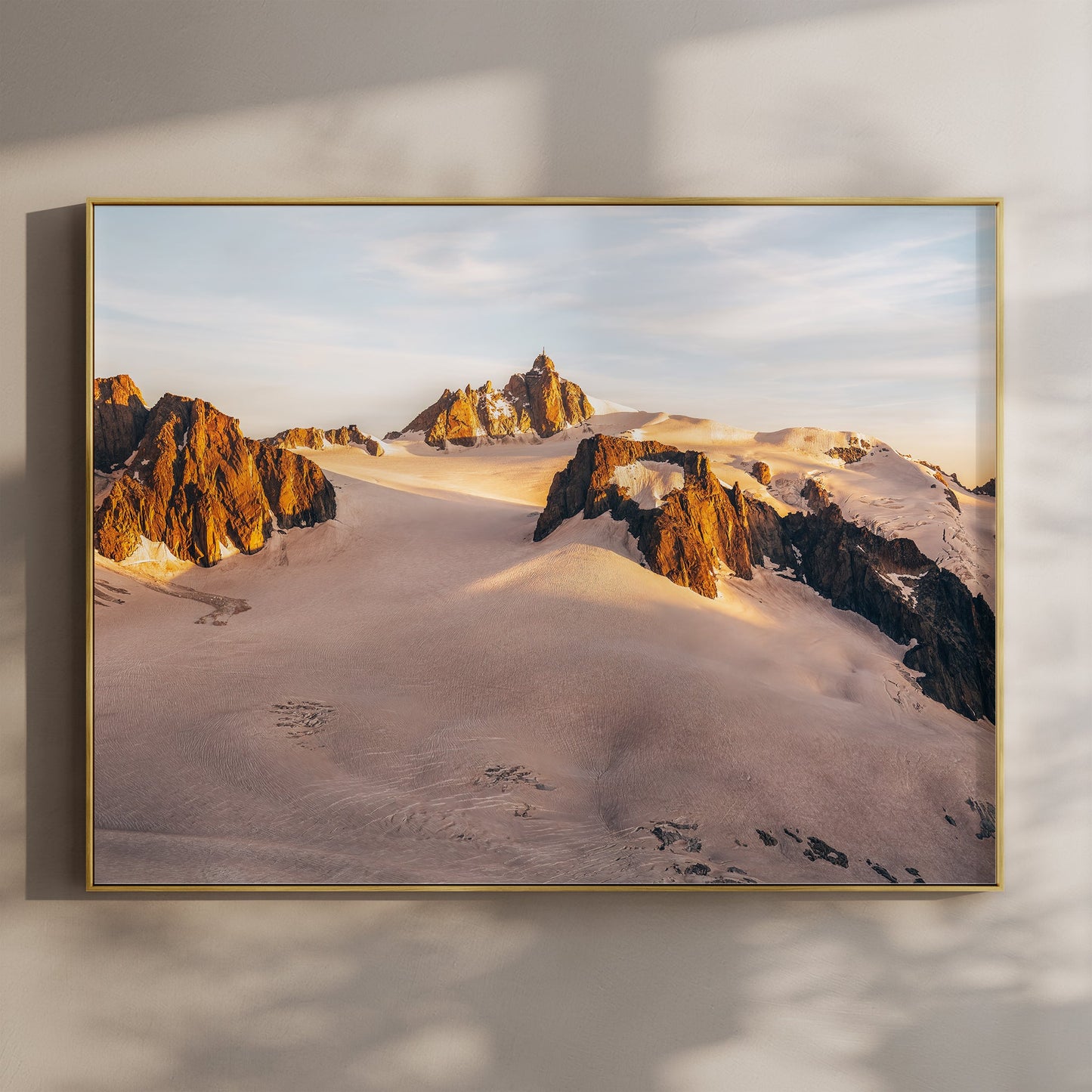 Chamonix mountain sunset photography print with glowing light on jagged peaks and glacier textures.