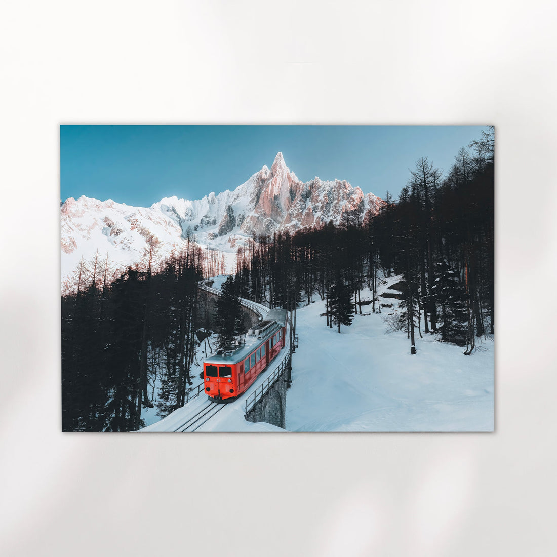 Scenic Chamonix mountain train art print showcasing a breathtaking ride through the snow-covered French Alps.