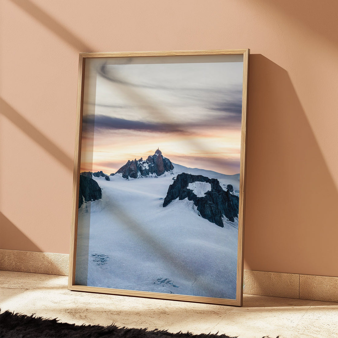 A captivating photography print of Chamonix’s Aiguille du Midi, illuminated by the last rays of daylight.