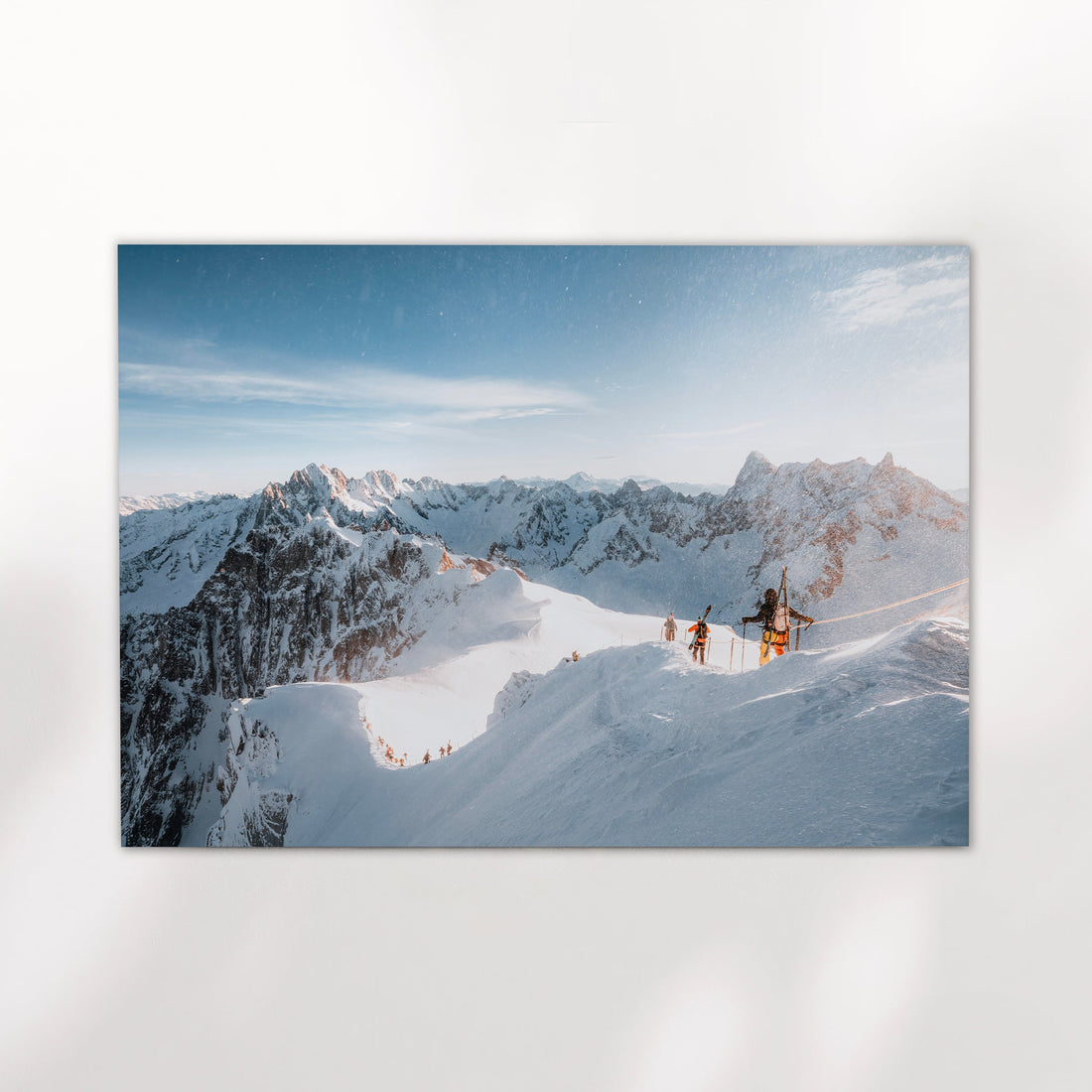 Chamonix ski touring wall art featuring mountaineers crossing a high alpine ridge in fresh powder.