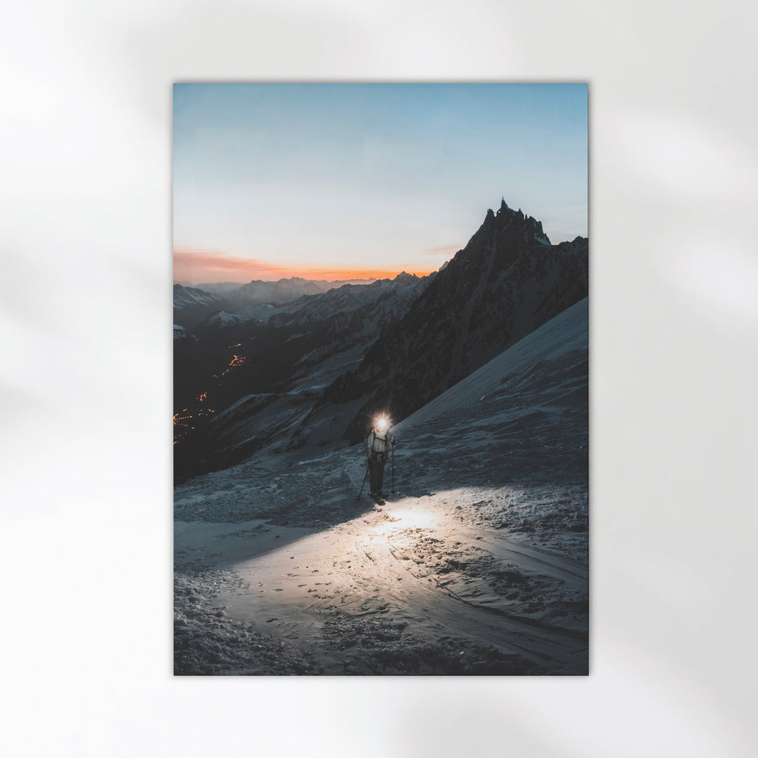 Fine art print of ski mountaineer in Chamonix at dusk with snowy alpine peaks