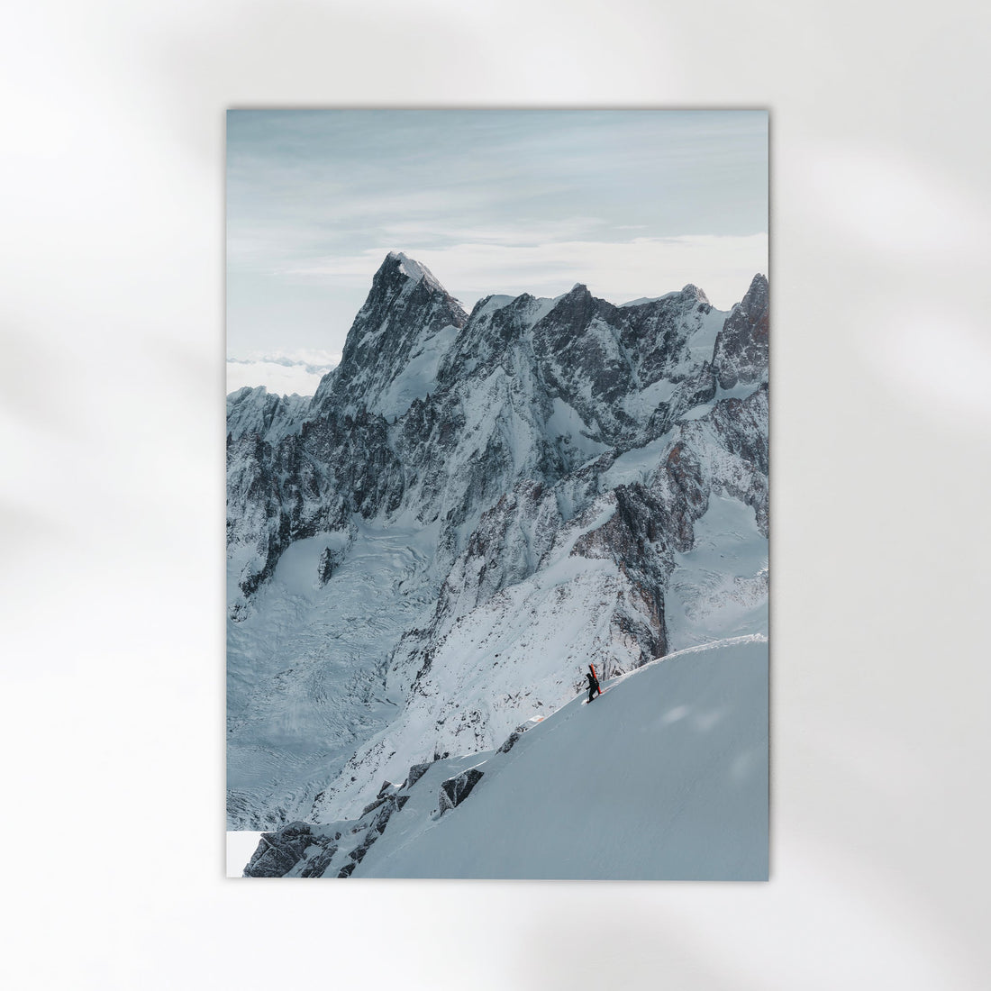 Captivating Chamonix skiing photography print capturing a skier navigating the breathtaking Midi Arete.