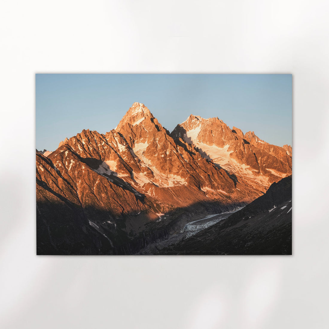 Sunrise over Chamonix mountains in this fine art print of Aiguille du Chardonnet glowing in warm alpine tones.