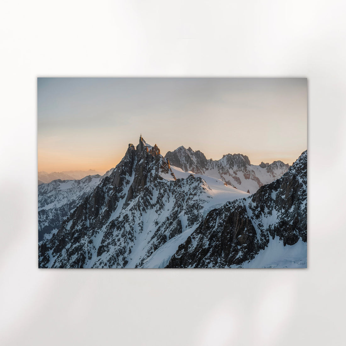 Chamonix mountain photography print featuring a winter sunset view of Aiguille du Midi's jagged peak.