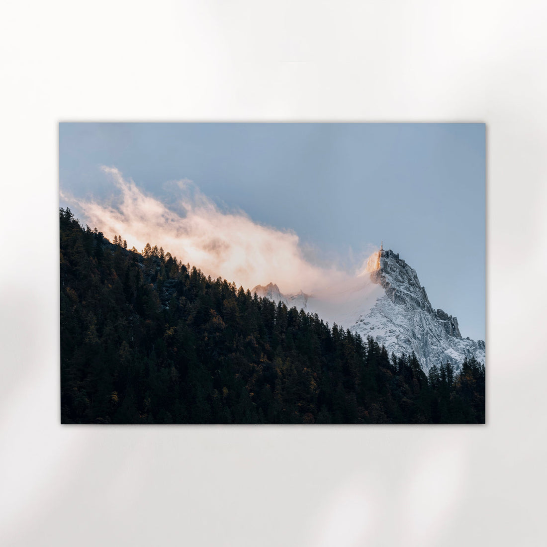 Chamonix mountain wall art print featuring sunset clouds and golden light on Aiguille du Midi peak.