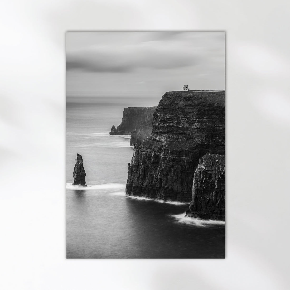 Fine art print of the Cliffs of Moher in monochrome on minimal white wall