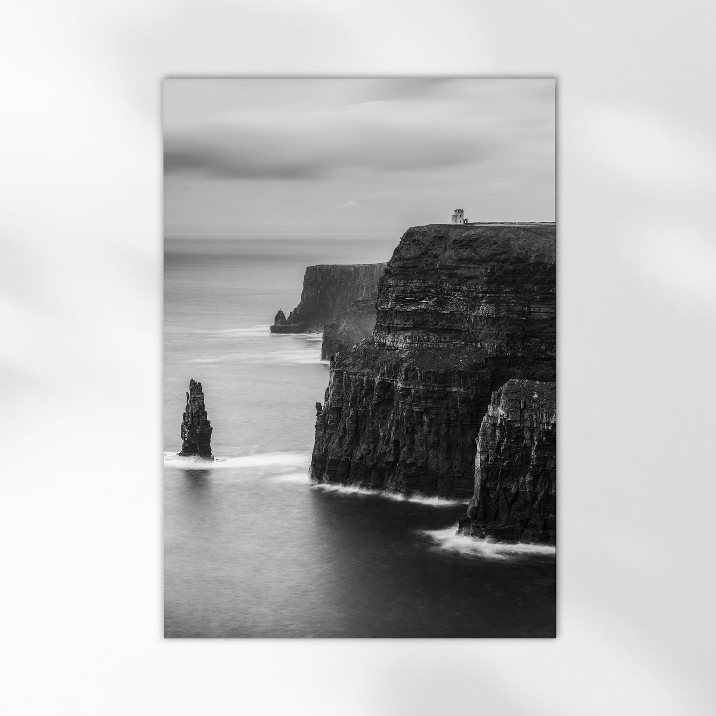 Fine art print of the Cliffs of Moher in monochrome on minimal white wall