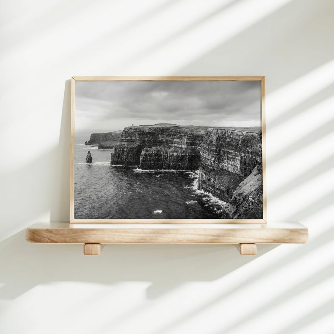 Monochrome Irish landscape artwork with shadowed natural light
