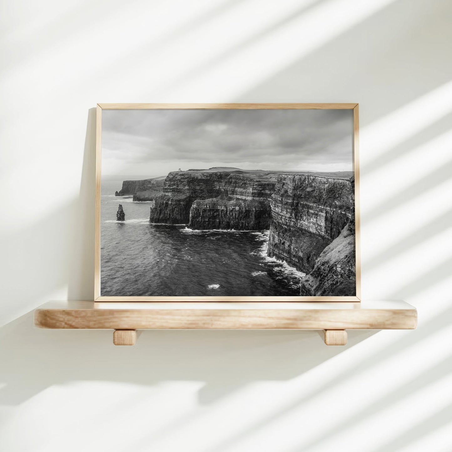 Monochrome Irish landscape artwork with shadowed natural light