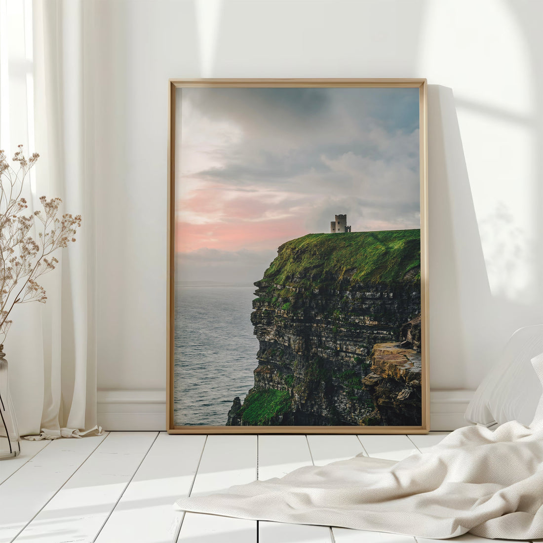 Sunset wall art print of the Cliffs of Moher, showing the ocean and rugged green headland