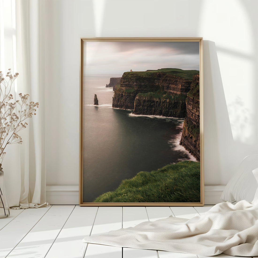 Large wall art print of the Cliffs of Moher styled with natural light and flowers