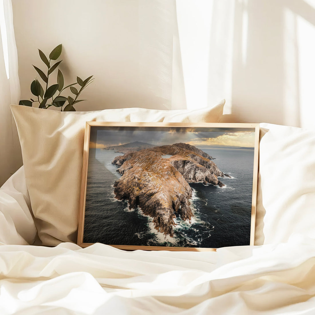 Landscape photo print of Sheep’s Head Island resting on a cream bed.