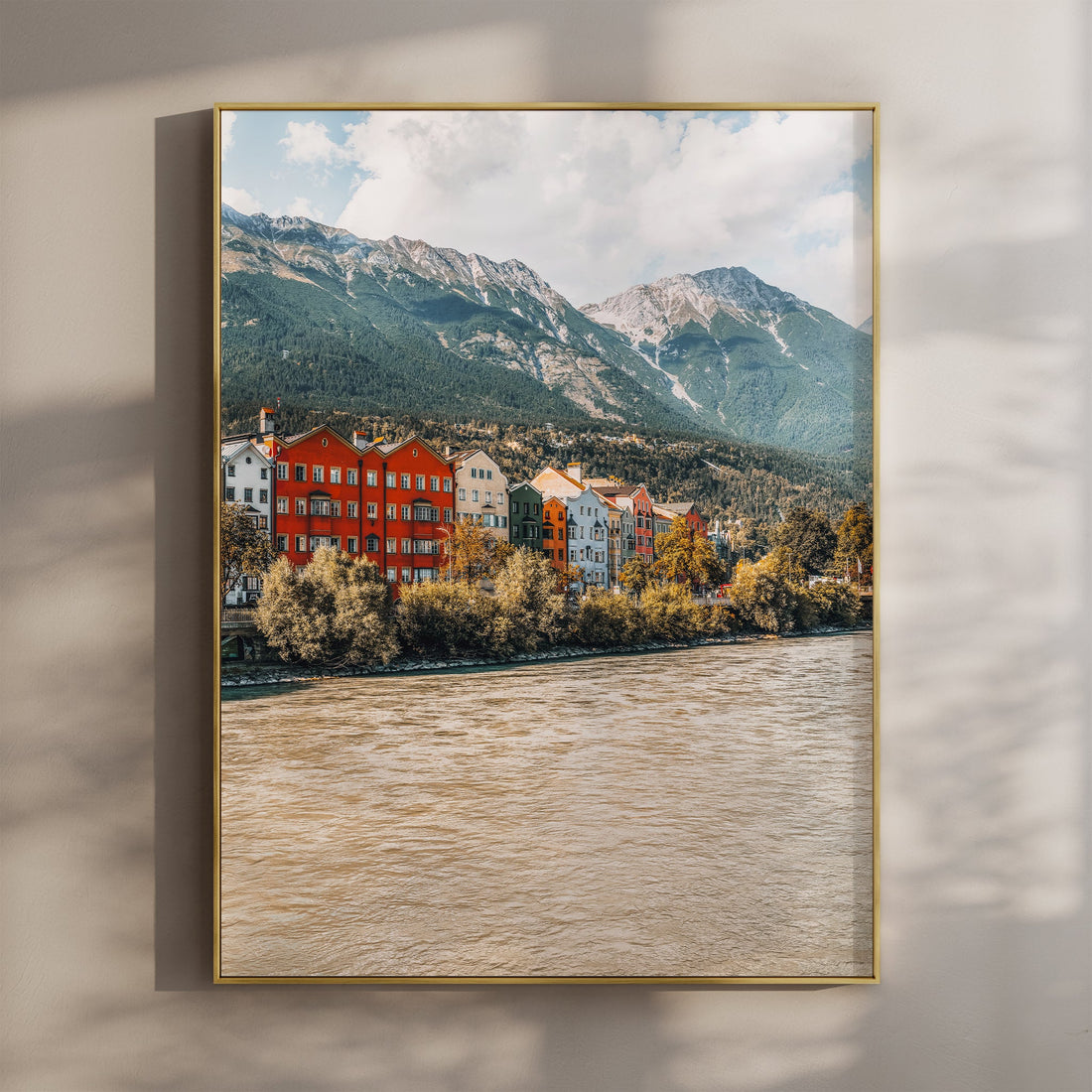 Colourful Innsbruck houses with mountain backdrop – alpine cityscape photography print.
