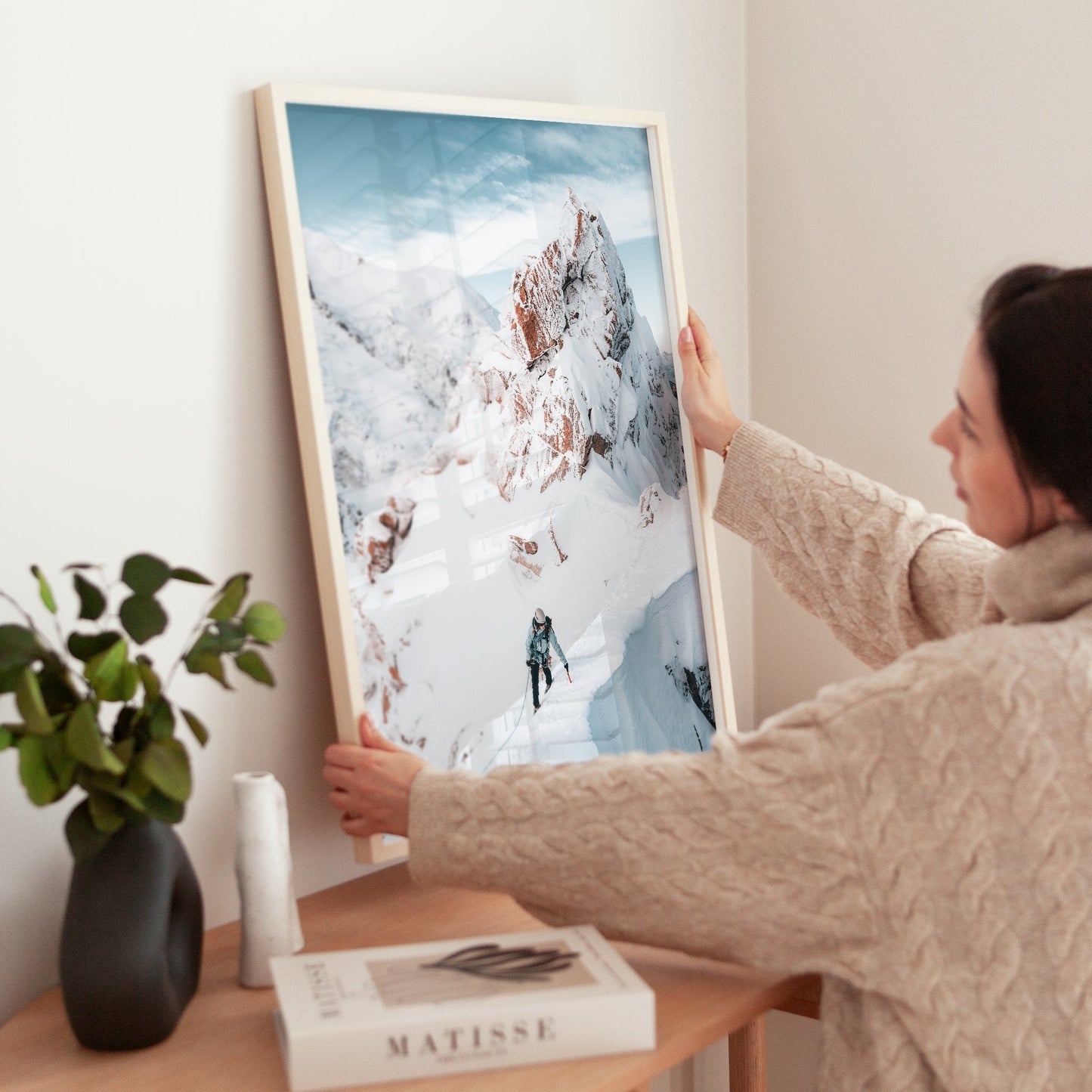 Winter mountaineering wall art print of a climber braving the snowy, exposed Cosmiques Ridge.
