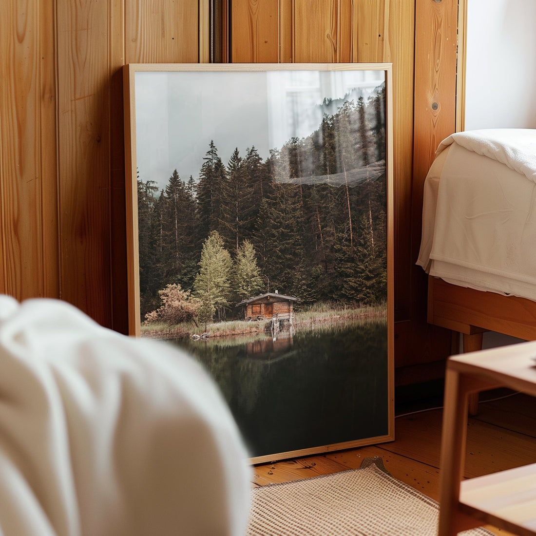 Mittersee alpine lake art print leaning against wooden bedroom wall