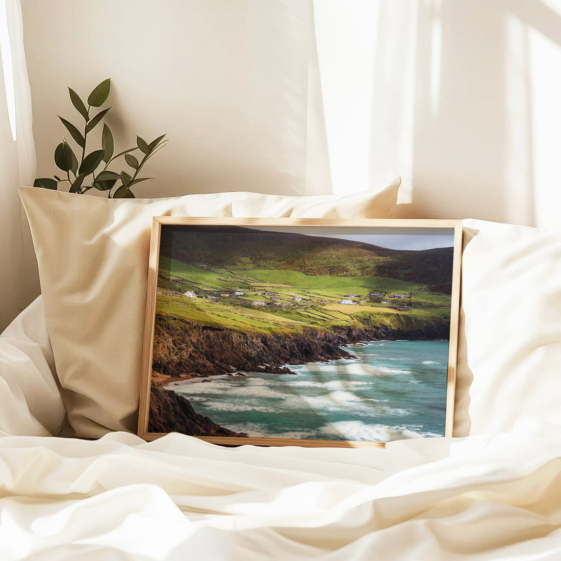Framed photograph of Coumeenoole Beach resting on a soft bed in natural light