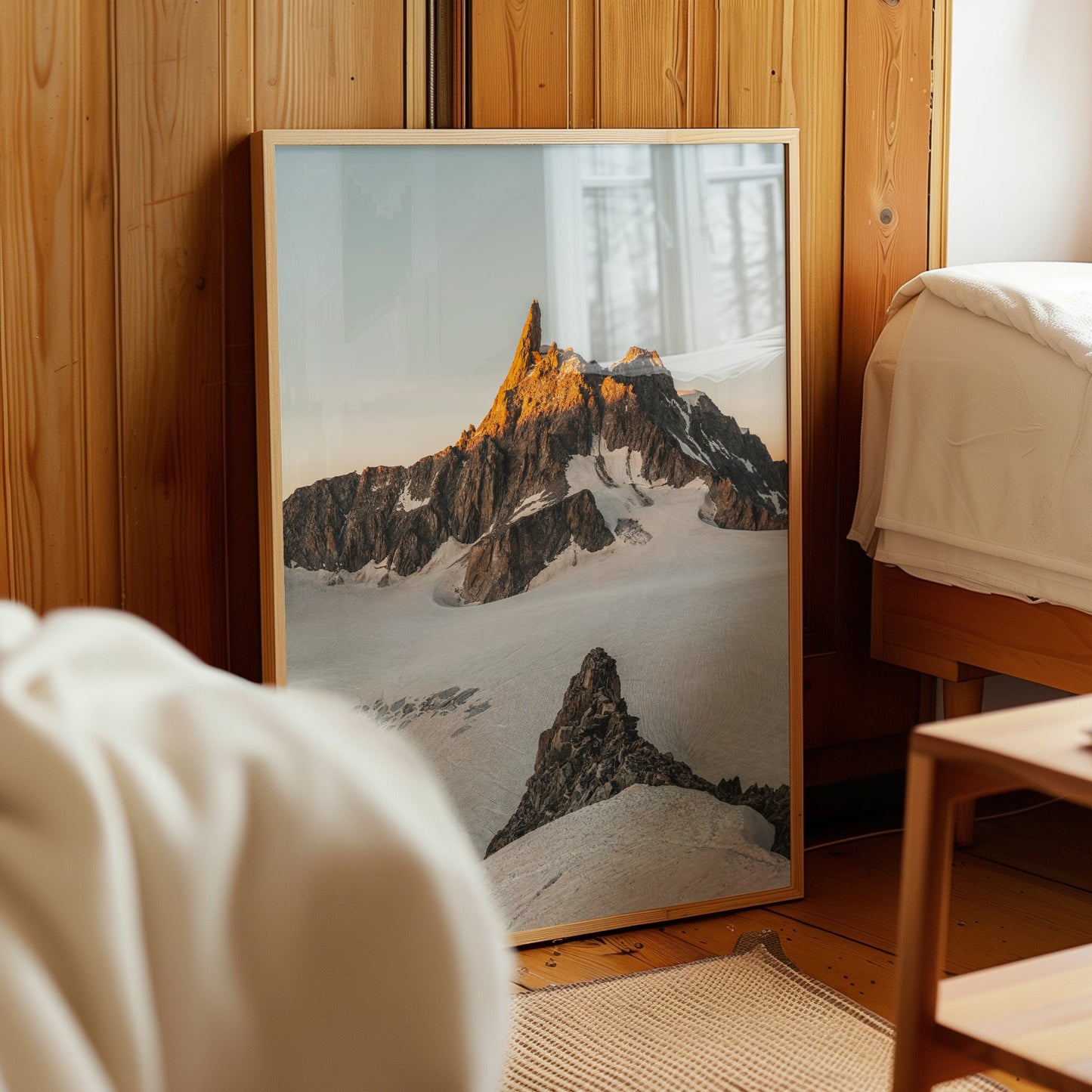 Striking summit photography of Dent du Géant with a snow-covered glacier and rugged rock formations.