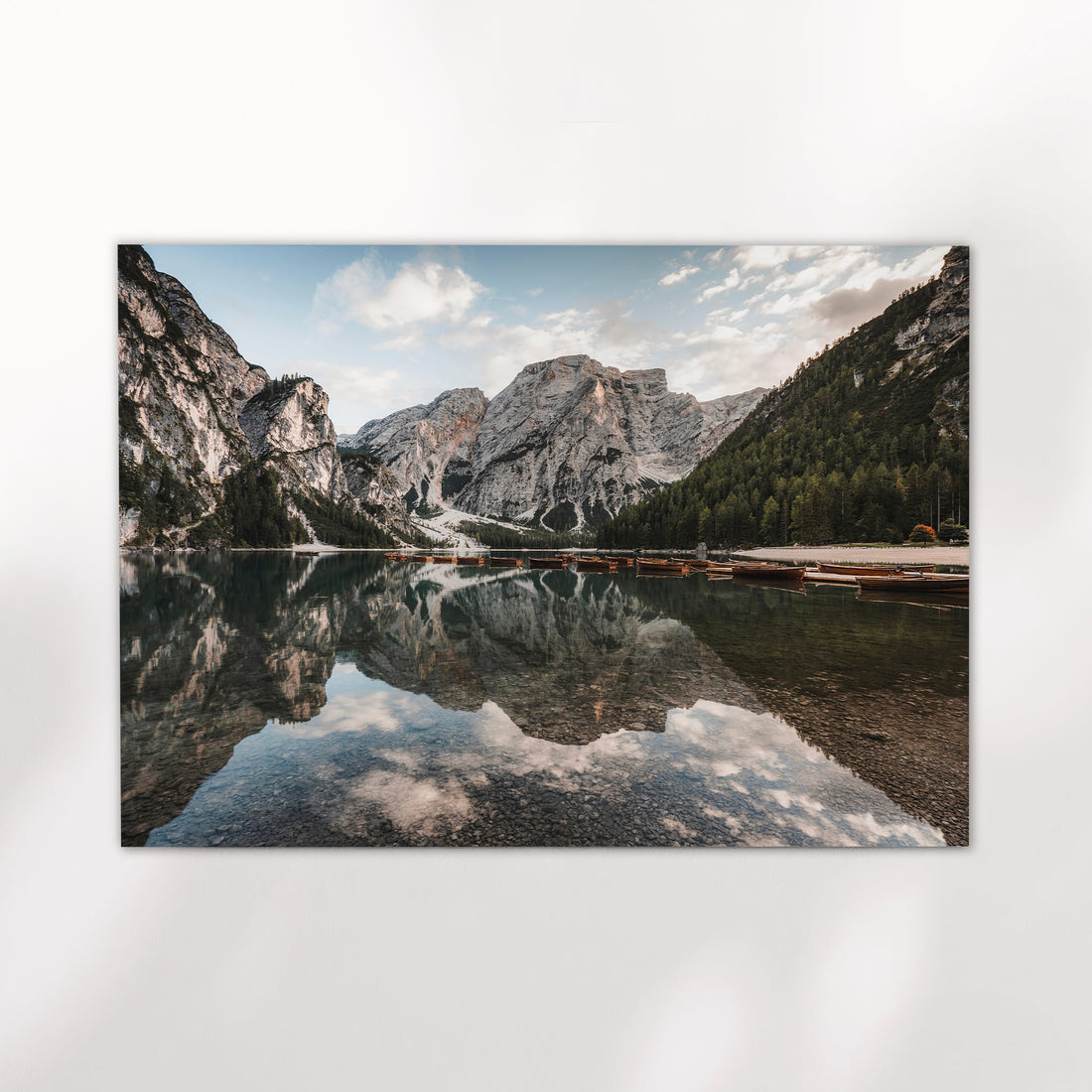 Unframed Lago di Braies Dolomites wall art print with clear water and boats