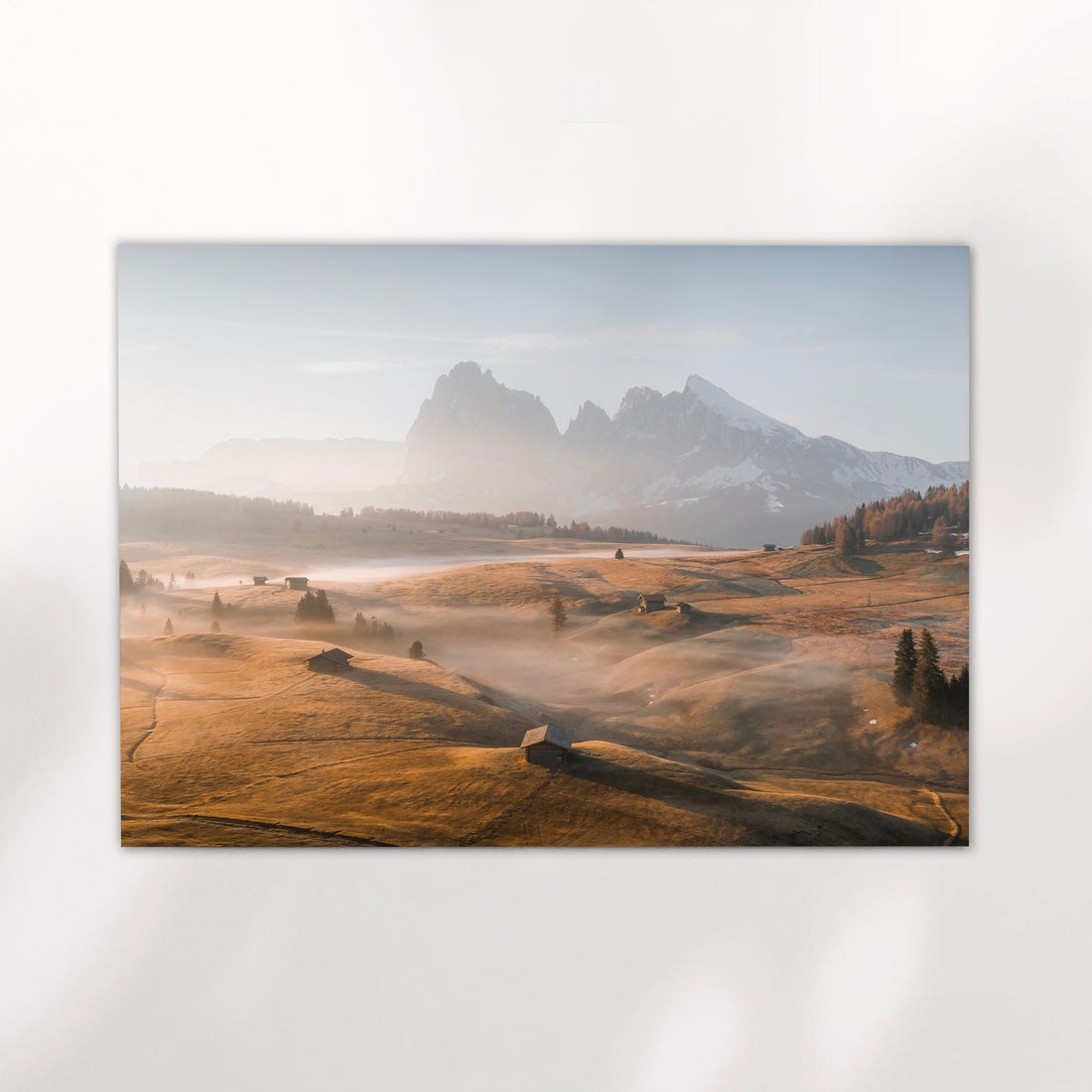Breathtaking Dolomites landscape print featuring early morning mist and soft alpine lighting.