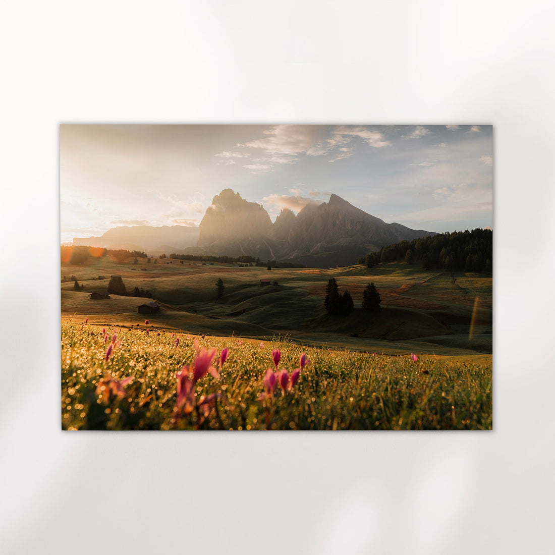 Scenic landscape photography print of the Dolomites with rolling green fields and a dreamy sunset.