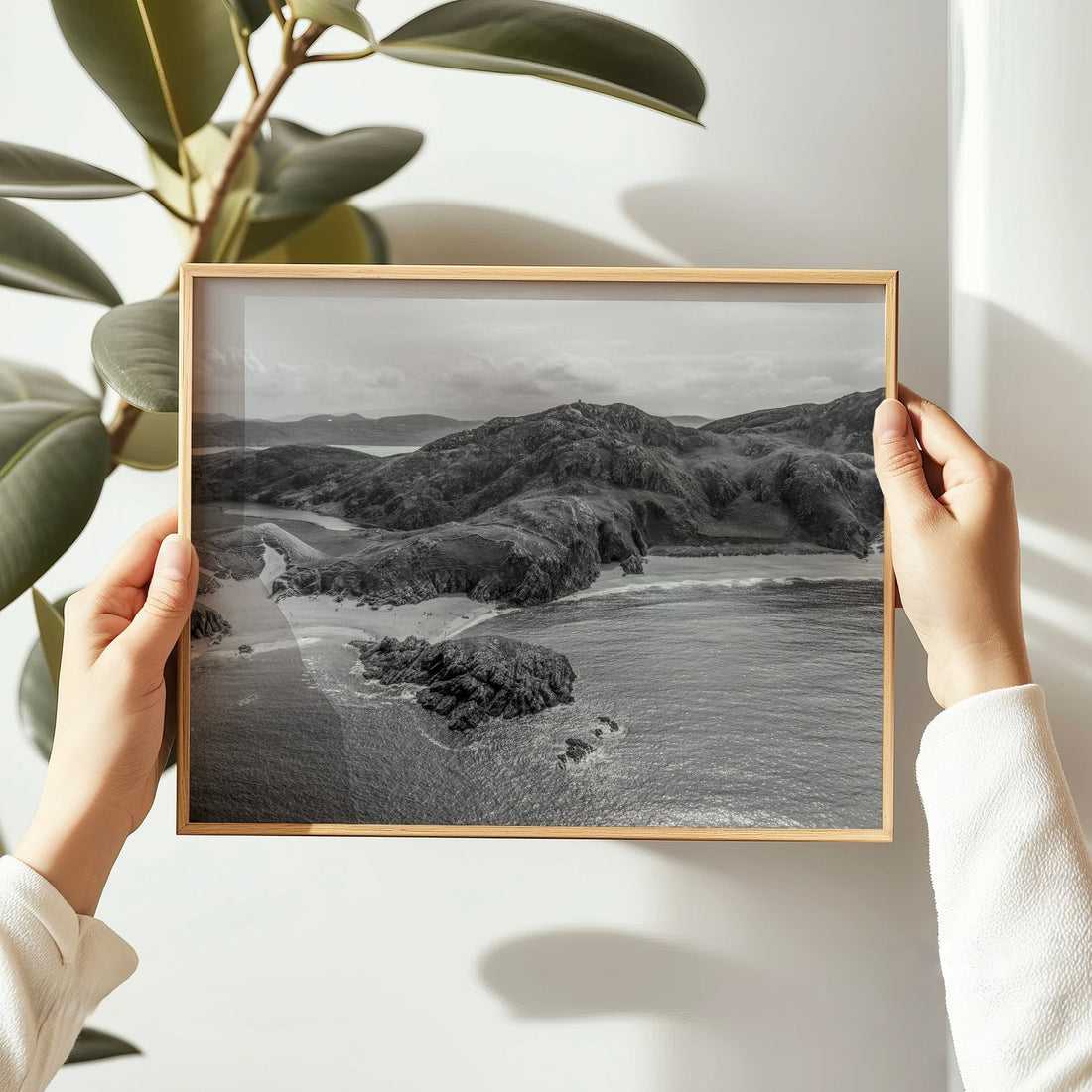 Monochrome art print of secluded beach and rocky shoreline