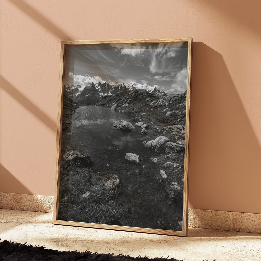 Dramatic black and white mountain print featuring the mirror-like waters of Lac Flégère at sunset.