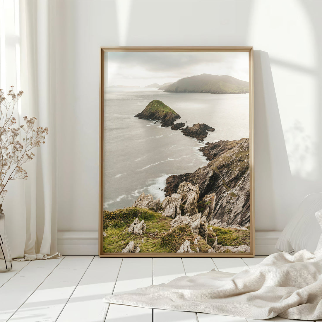 Interior mockup of a Dunmore Head print with golden light on Irish cliffs