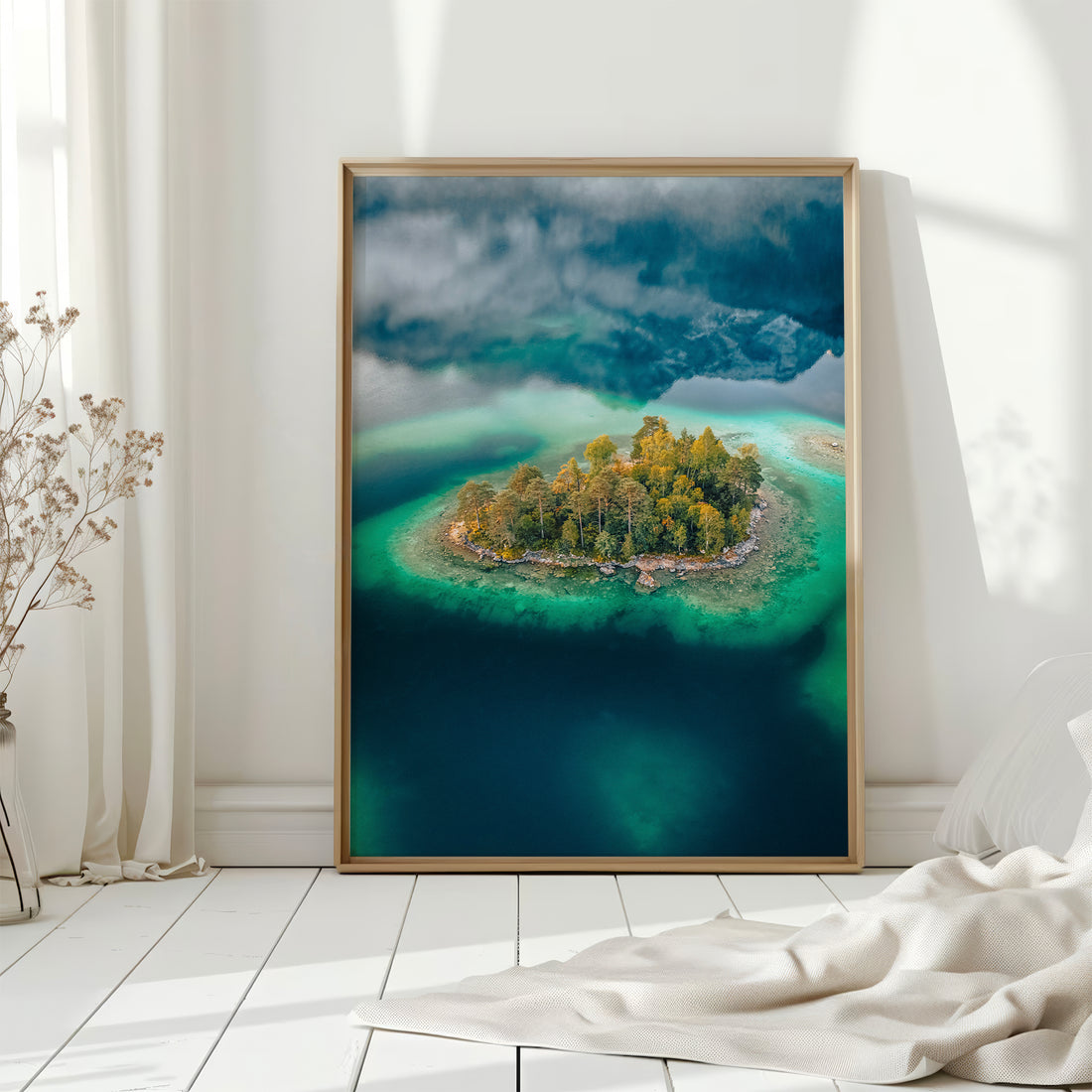 Vibrant Eibsee wall print in a minimal white room with sun pouring in