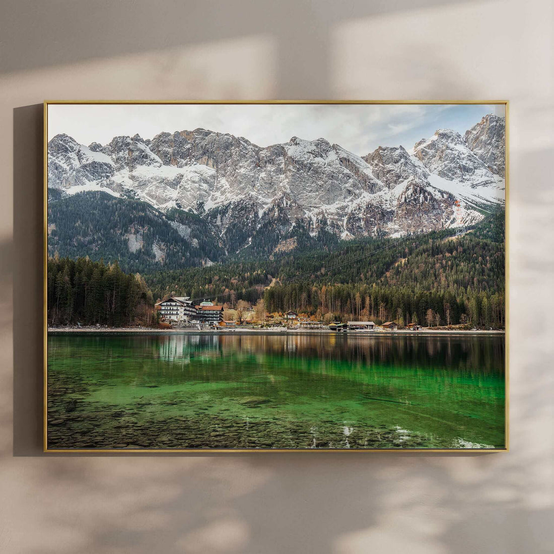 Eibsee lake with green water and snowy mountain reflections in Bavaria, Germany