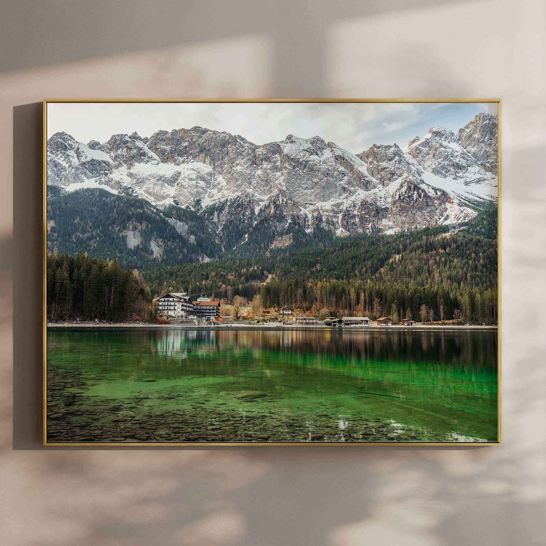 Eibsee lake with green water and snowy mountain reflections in Bavaria, Germany