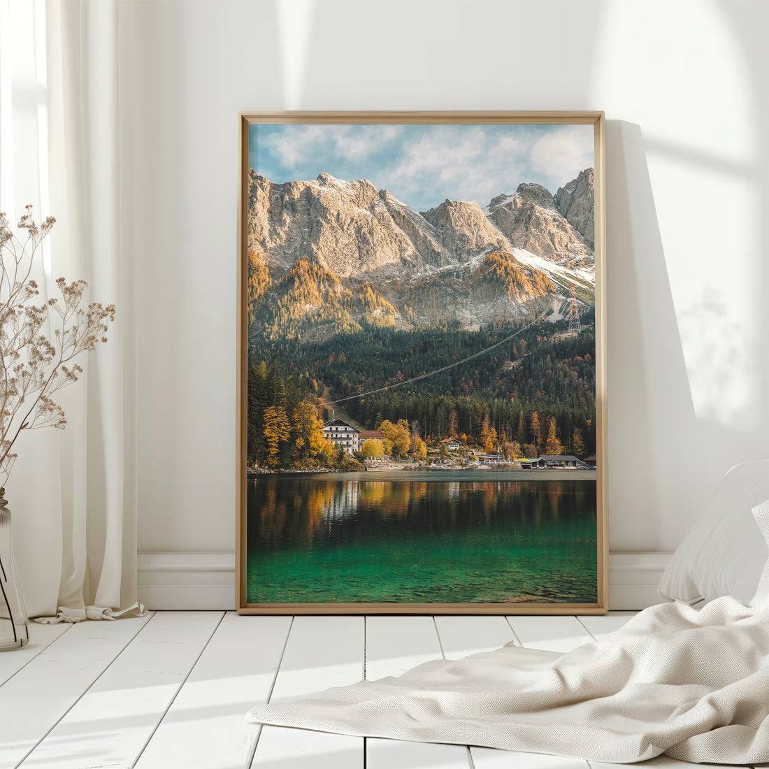 Eibsee landscape print leaning on floor in bright minimalist interior