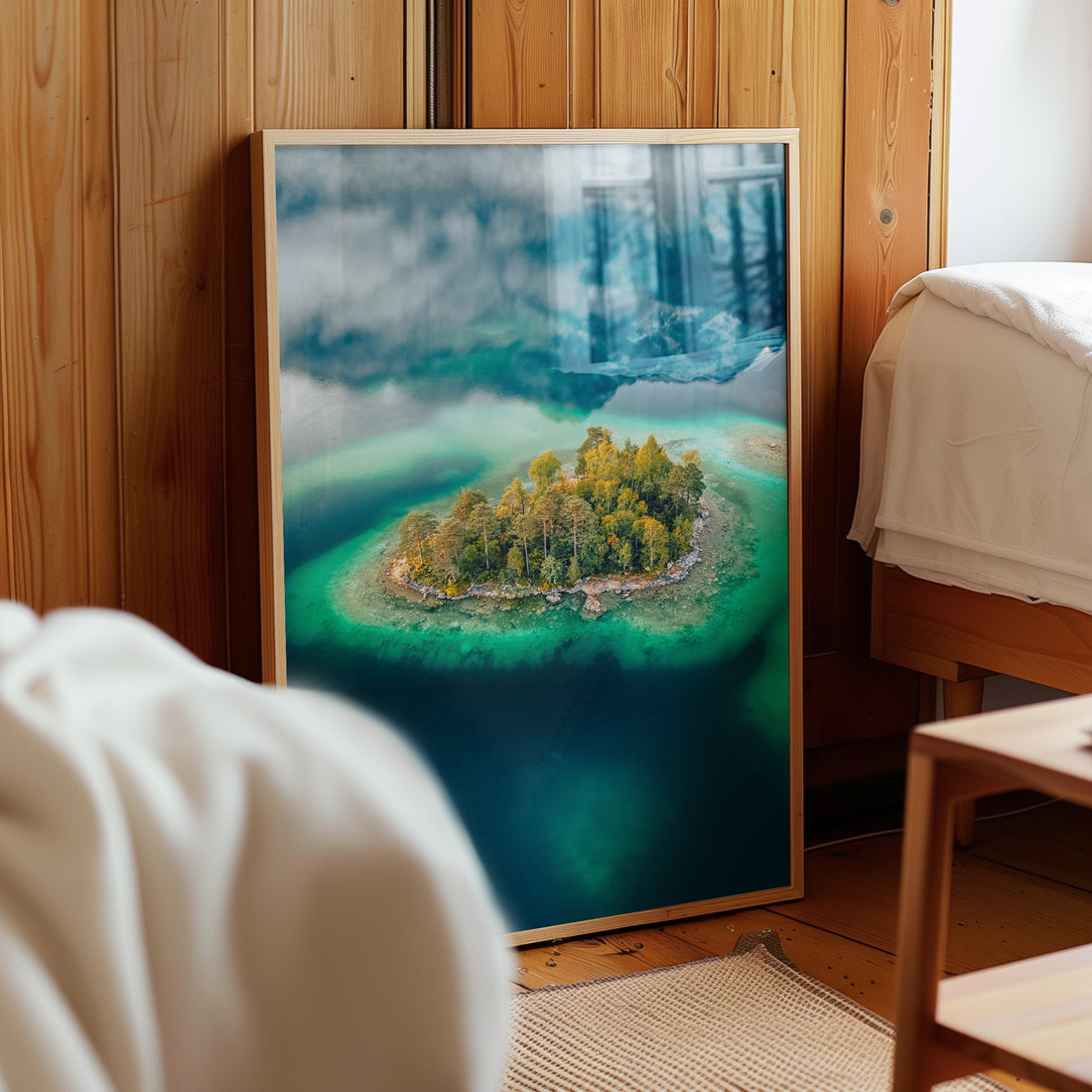 Nature print of Eibsee island leaning in rustic wooden bedroom setting