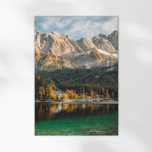 Serene reflections on Eibsee with forest and mountains under a blue sky