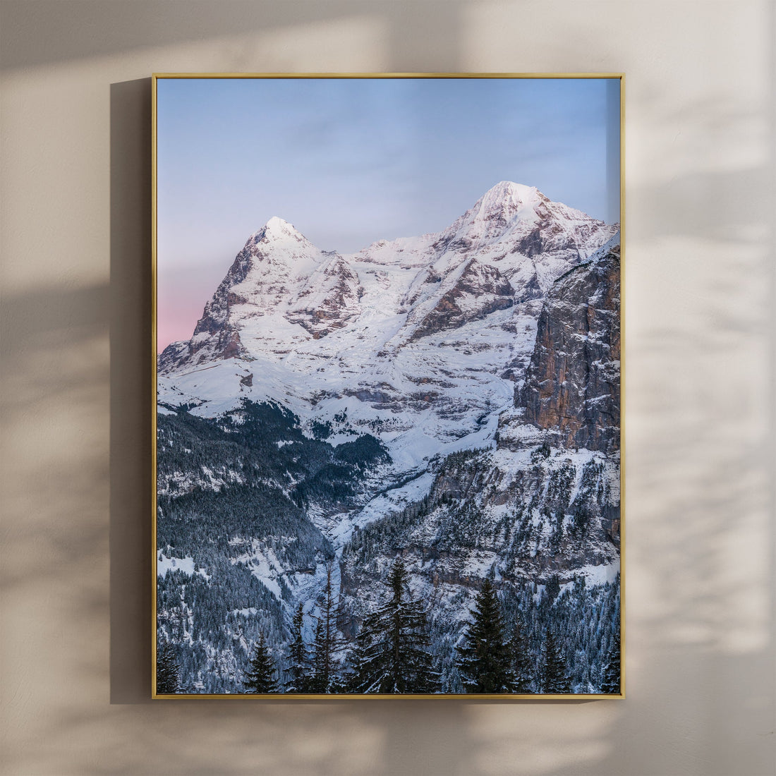 Breathtaking Eiger and Mönch mountain wall art print capturing the Swiss Alps' dramatic winter landscape.
