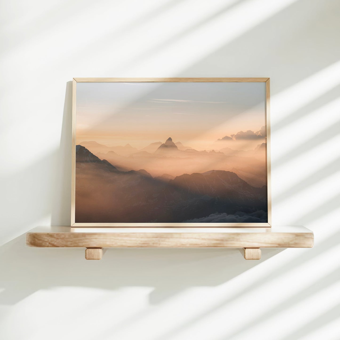 Fine art scenic print of the Matterhorn at dawn, framed by a tranquil mist-filled mountain landscape.