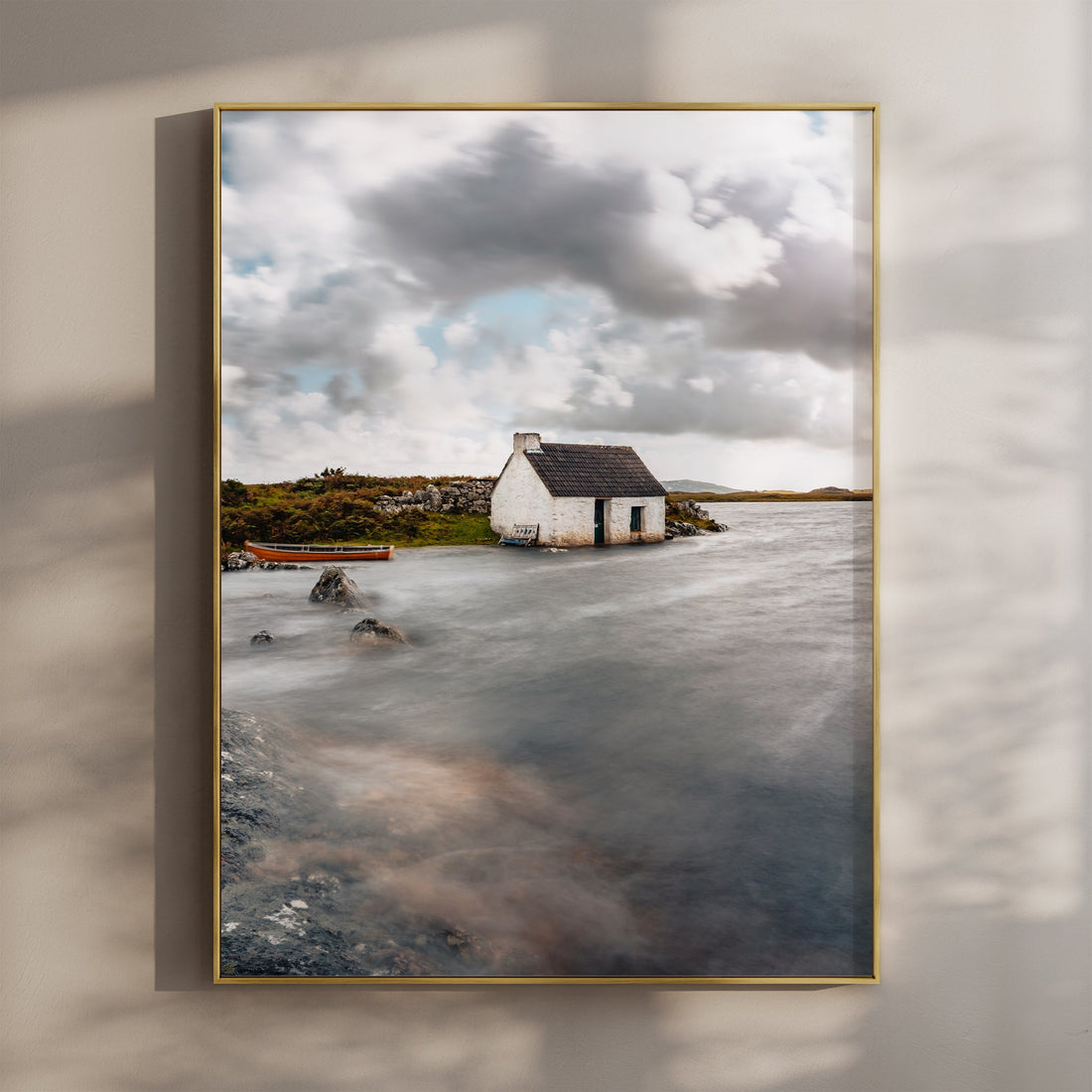 Irish fisherman's bothy by the sea under dramatic skies – wall art print
