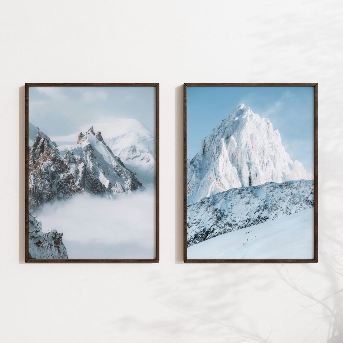 Aiguille du Midi and Grands Montets prints with a modern dark wood frame against a light background.