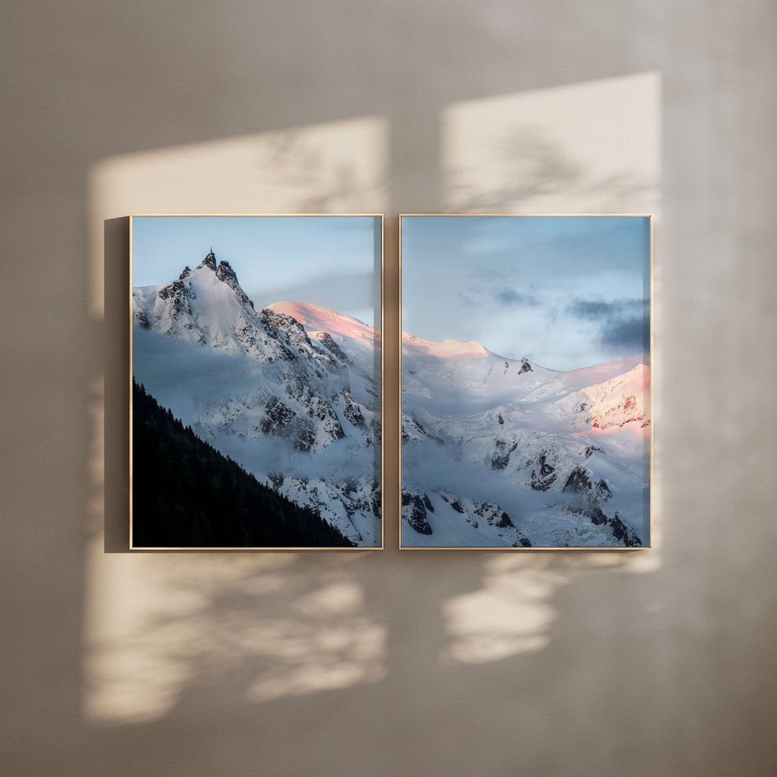 Aiguille du Midi and Mont Blanc bathed in golden sunrise, framed and styled in an elegant modern dining room