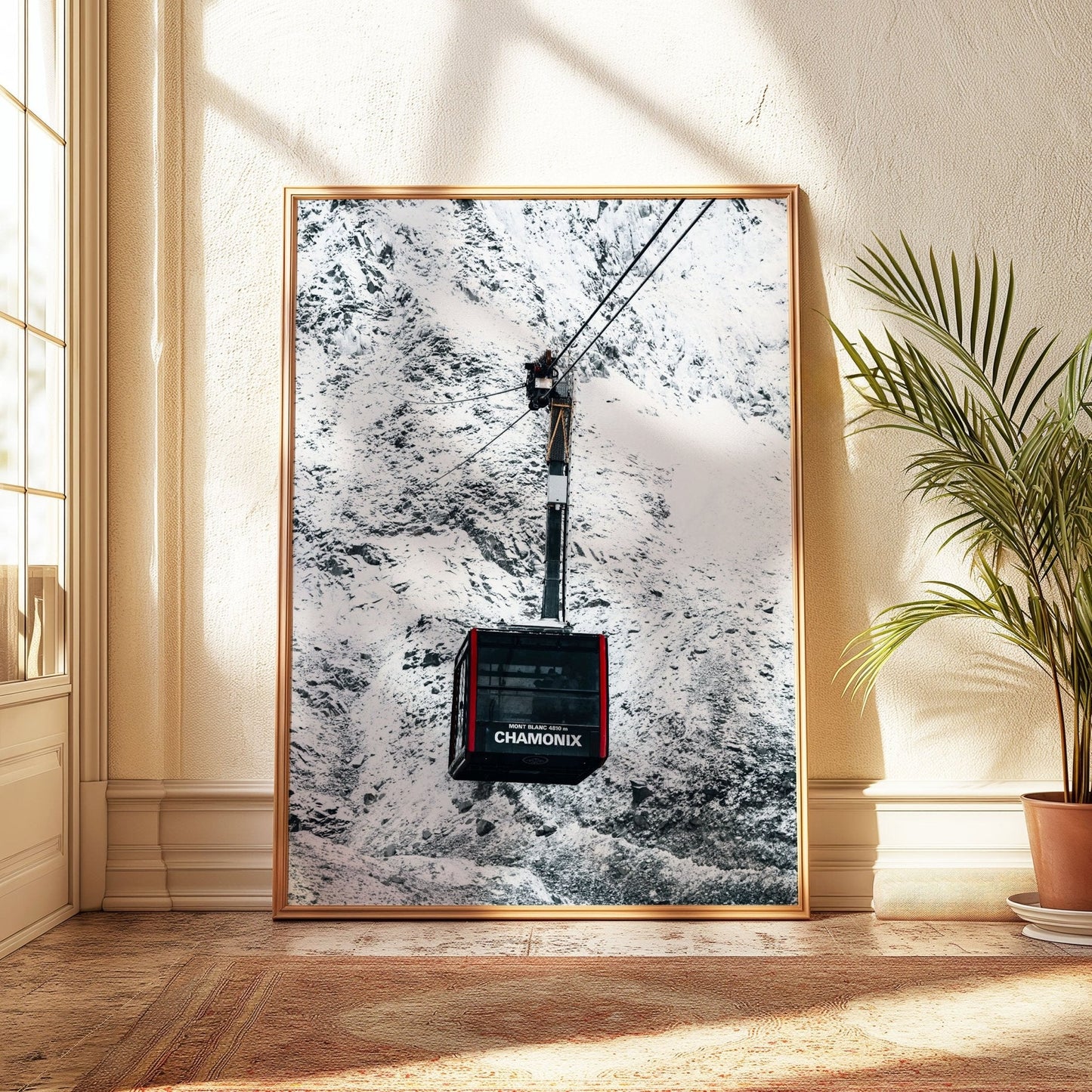 Chamonix cable car surrounded by majestic snowy mountains