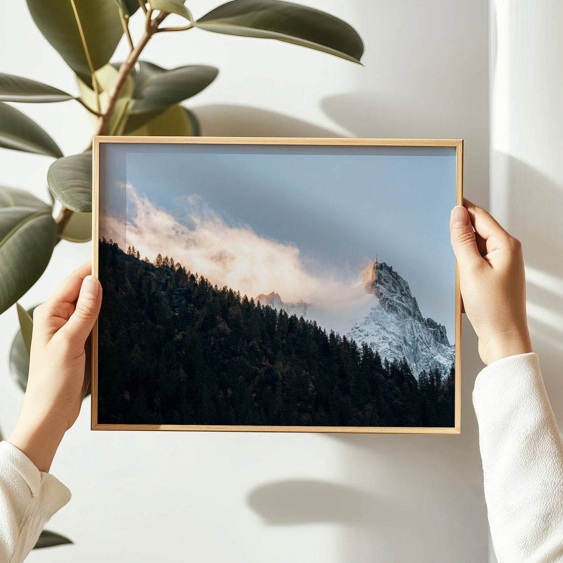 A French Alps photography print showing Aiguille du Midi glowing with warm evening light and pine forest.