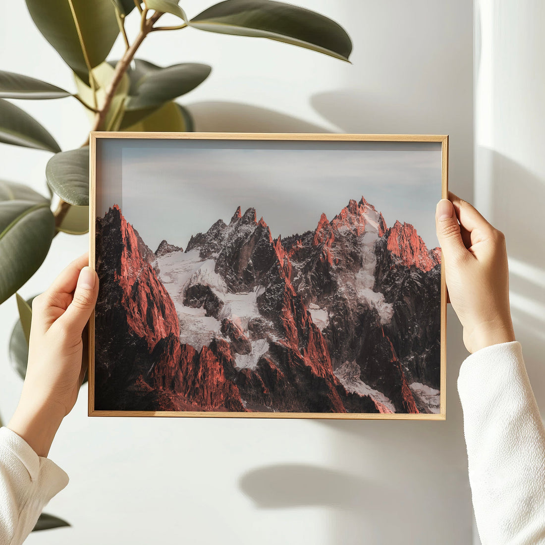 Fine art print of the Aiguilles du Mont Blanc, capturing the rugged French Alps in golden light.