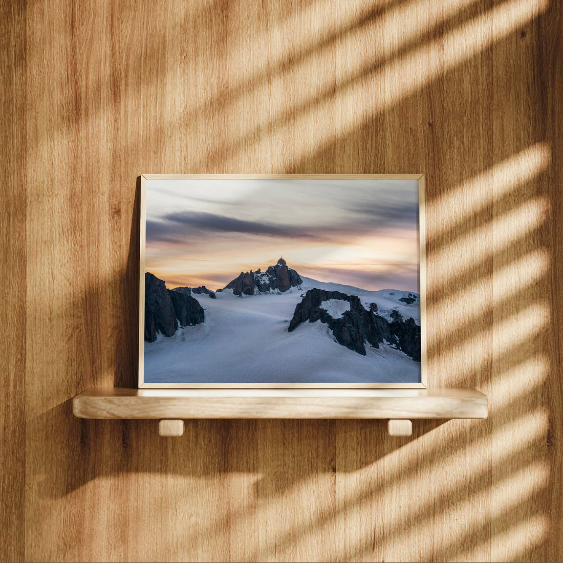 Striking French Alps photo print of the Aiguille du Midi summit during a soft evening light.