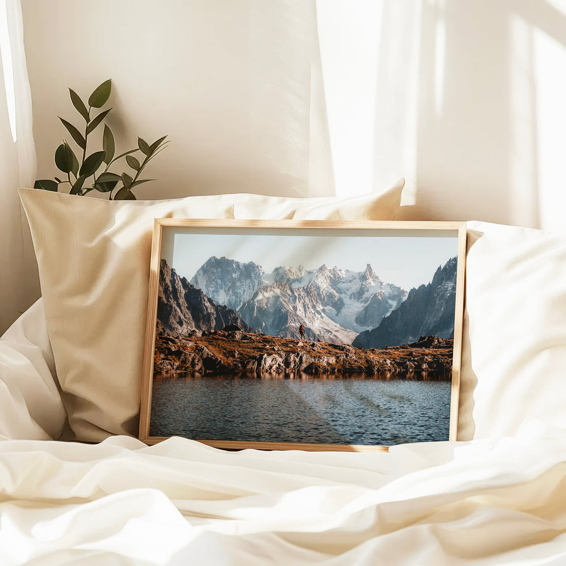 Peaceful reflection of the French Alps on a calm mountain lake, perfect for nature-inspired wall decor.
